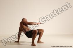 Underwear Gymnastic poses Man Black Muscular Bald Dancing Dynamic poses Academic